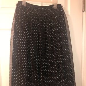 Polka dot puffy skirt. Bellow knee length